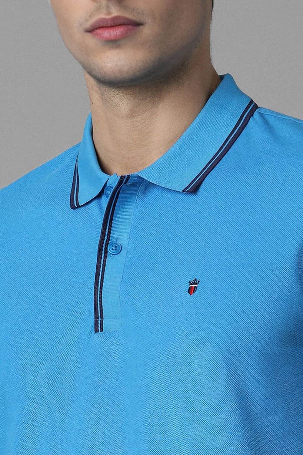 12110-men-blue-solid-polo-neck-t-shirt-blue-1.jpg