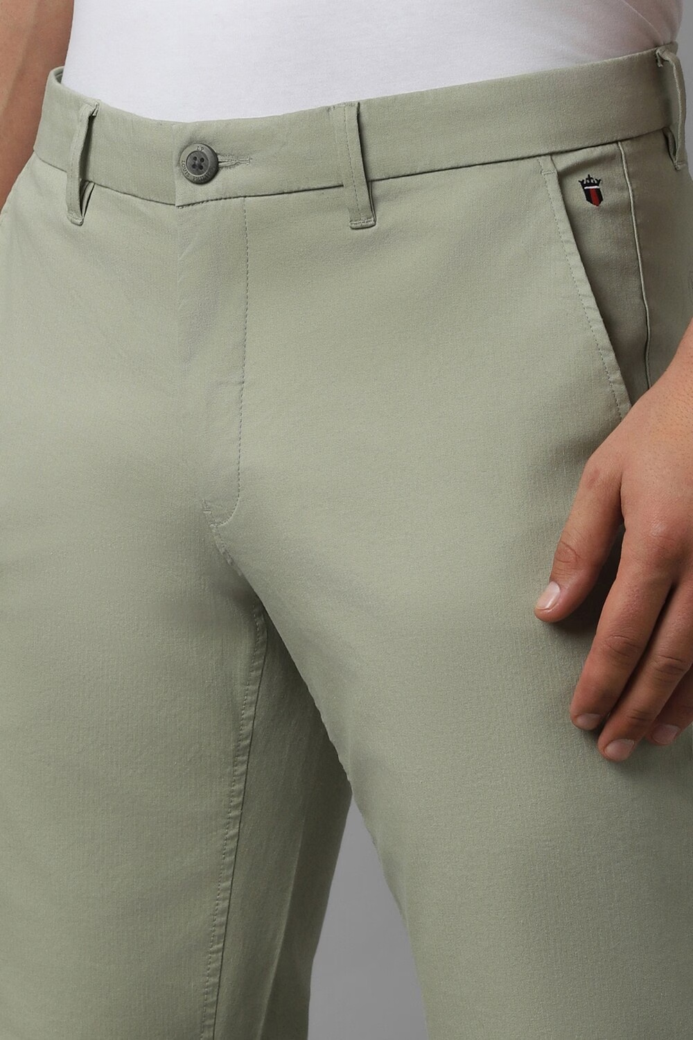 15671-men-green-slim-fit-solid-flat-front-casual-trousers-green-1.jpg