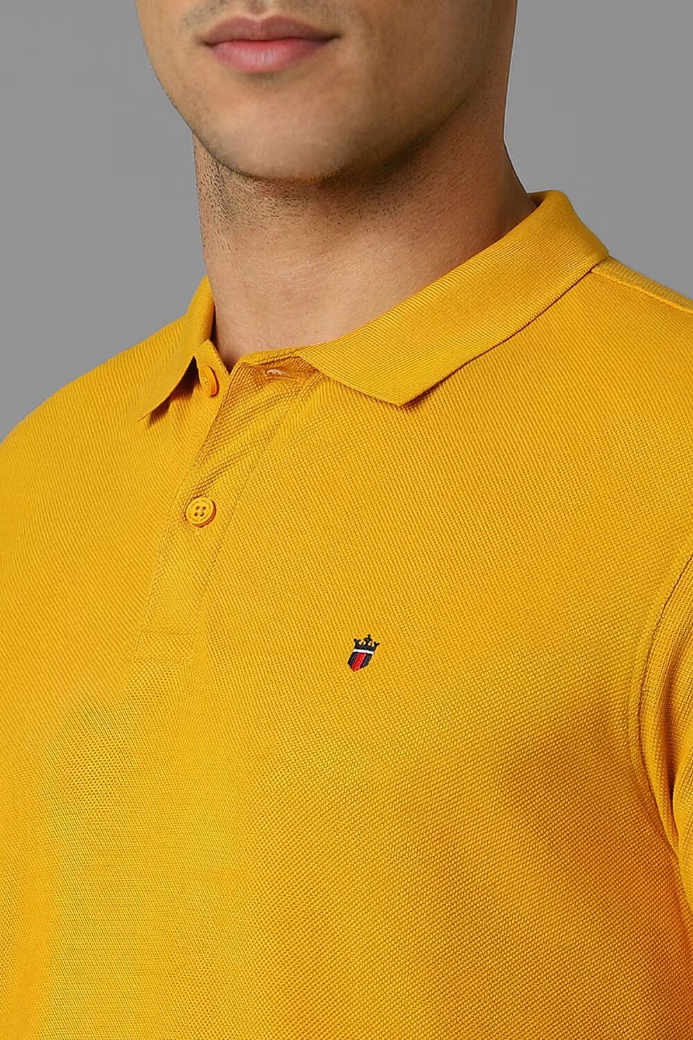 19515-men-yellow-solid-polo-neck-t-shirt-yellow-1.jpg