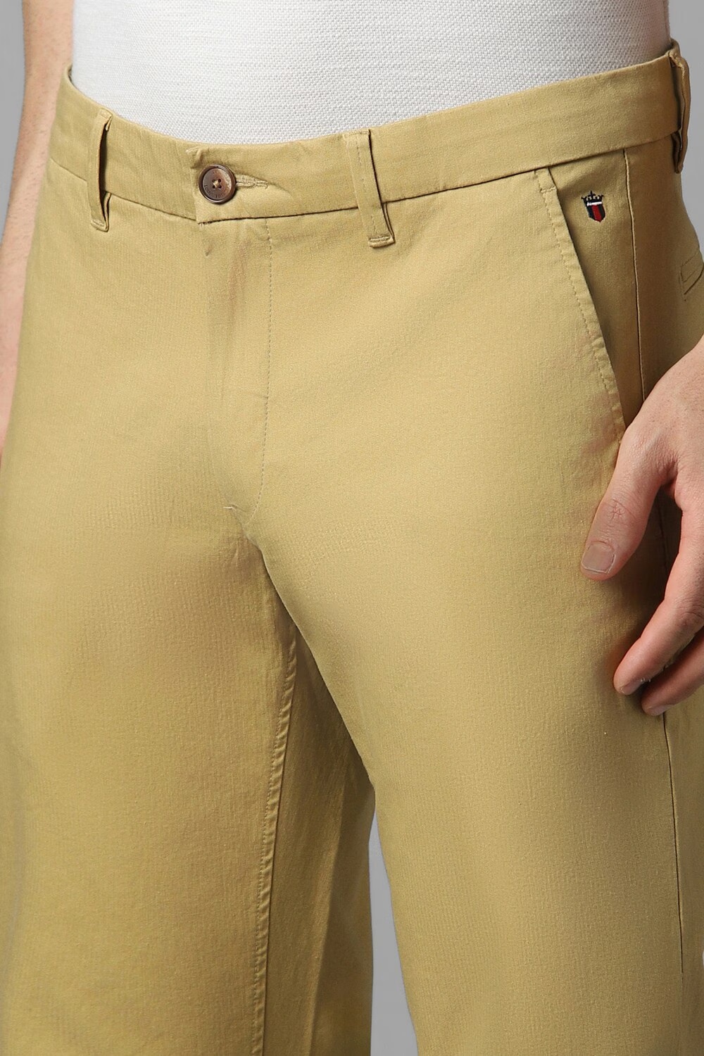 31825-men-khaki-slim-fit-solid-flat-front-casual-trousers-khaki-1.jpg