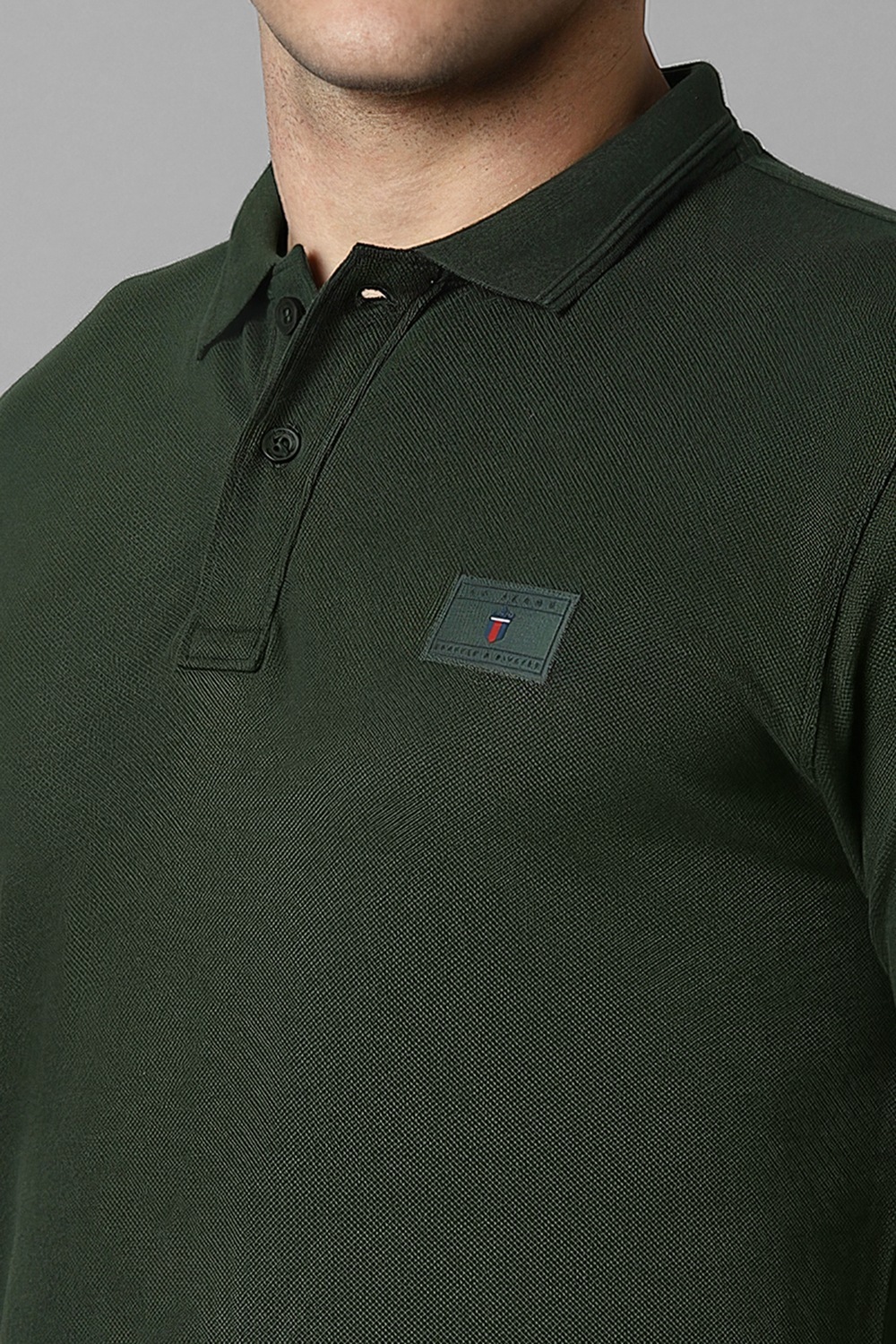 32329-men-green-textured-polo-neck-t-shirt-green-1.jpg