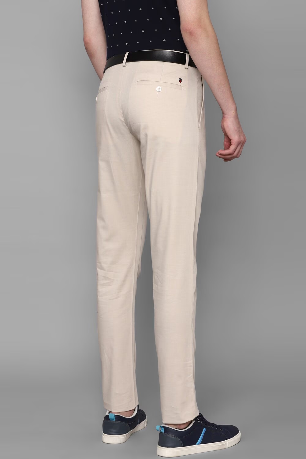 34146-men-cream-slim-fit-solid-flat-front-casual-trousers-cream-1.jpg