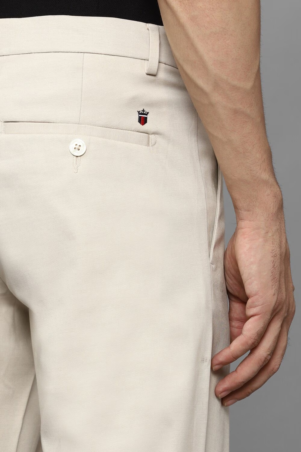 34146-men-cream-slim-fit-solid-flat-front-casual-trousers-cream-1.jpg