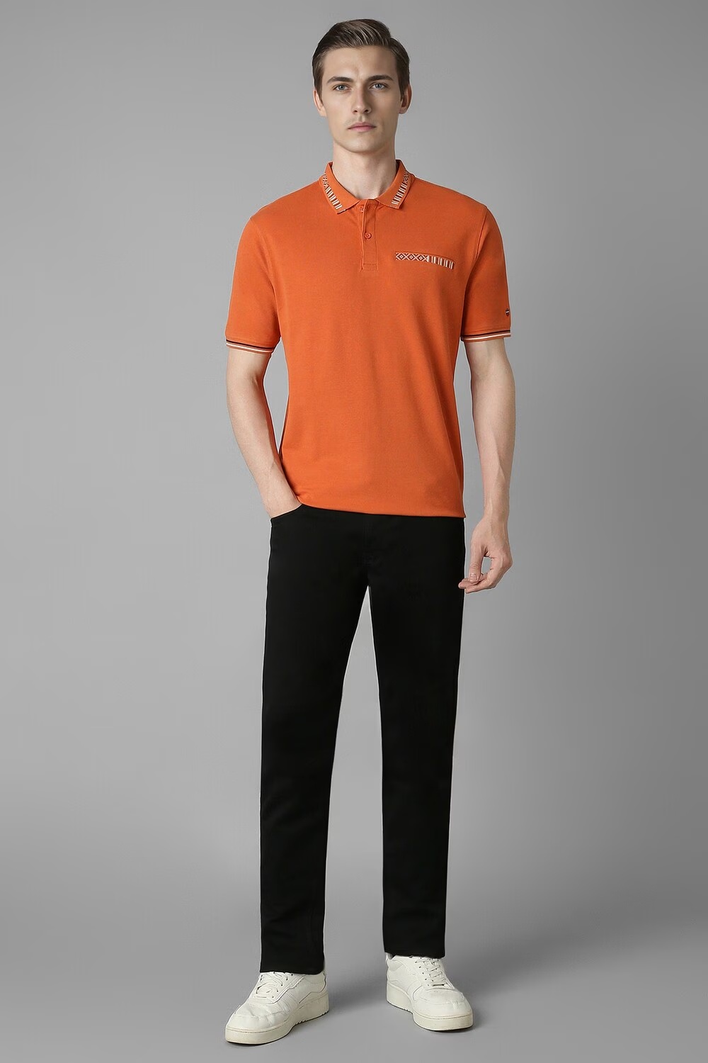 37672-men-orange-solid-polo-neck-t-shirt-orange-1.jpg