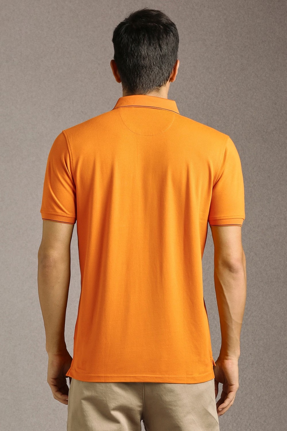42996-men-orange-solid-polo-neck-t-shirt-orange-1.jpg