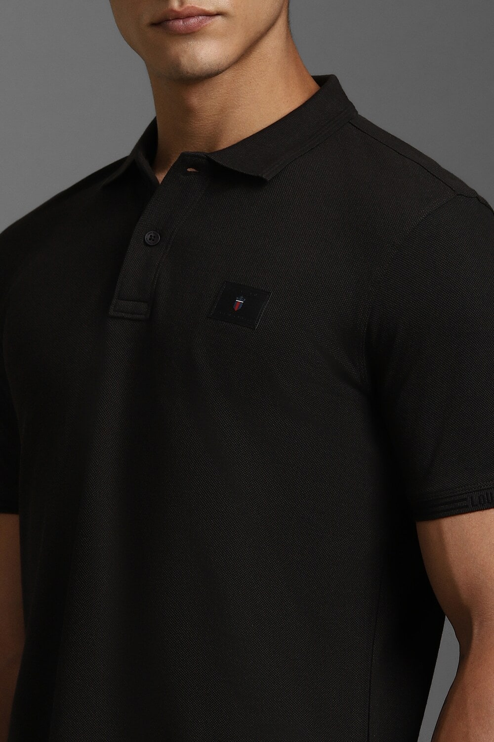 44537-men-black-solid-polo-neck-t-shirt-black-1.jpg