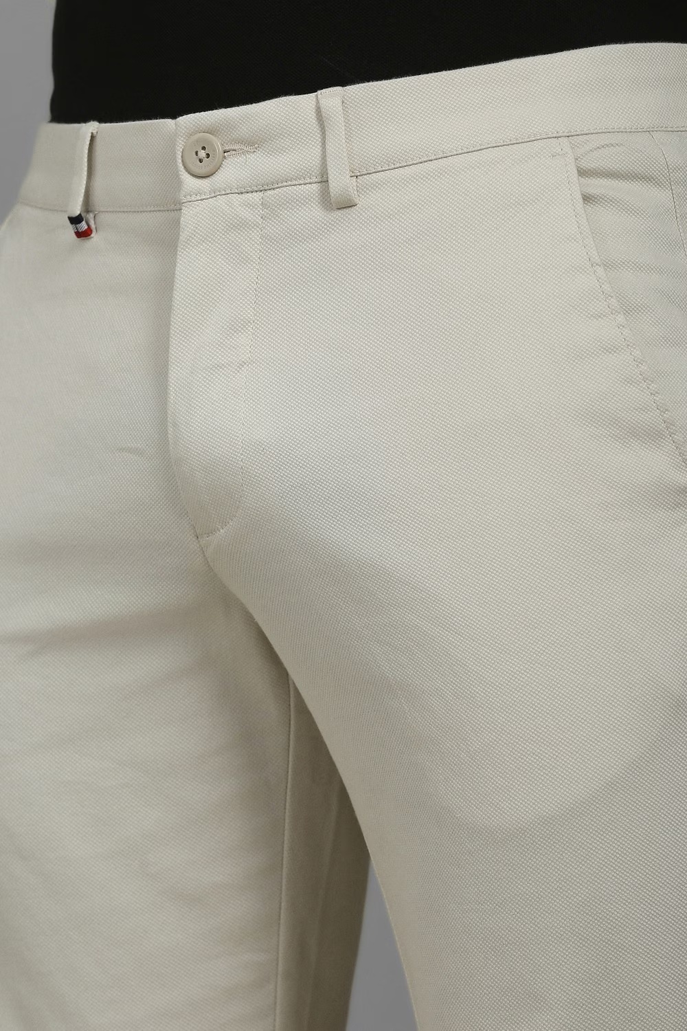 44589-men-white-super-slim-fit-textured-flat-front-casual-trousers-white-1.jpg