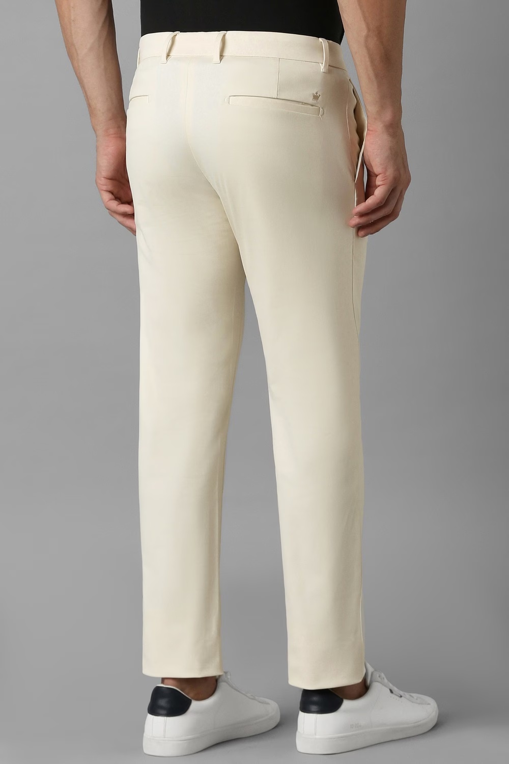 46583-men-cream-slim-fit-solid-flat-front-casual-trousers-cream-1.jpg