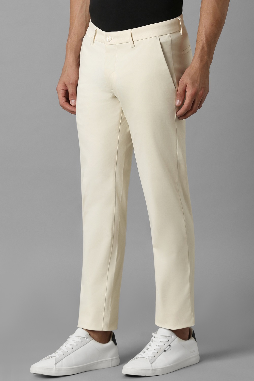 46583-men-cream-slim-fit-solid-flat-front-casual-trousers-cream-1.jpg