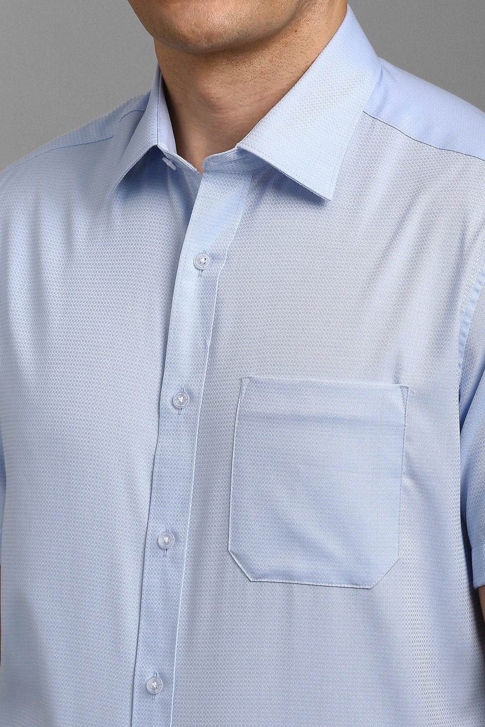 49125-men-light-blue-textured-half-sleeves-formal-shirt-light-blue-1.jpg