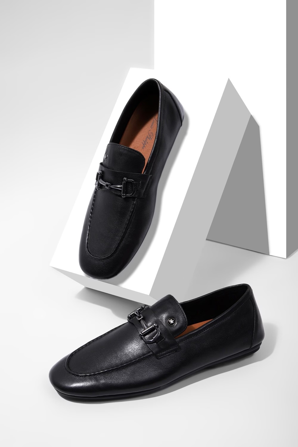 53020-men-unlined-metal-saddle-detail-leather-black-slip-on-shoes-black-1.jpg