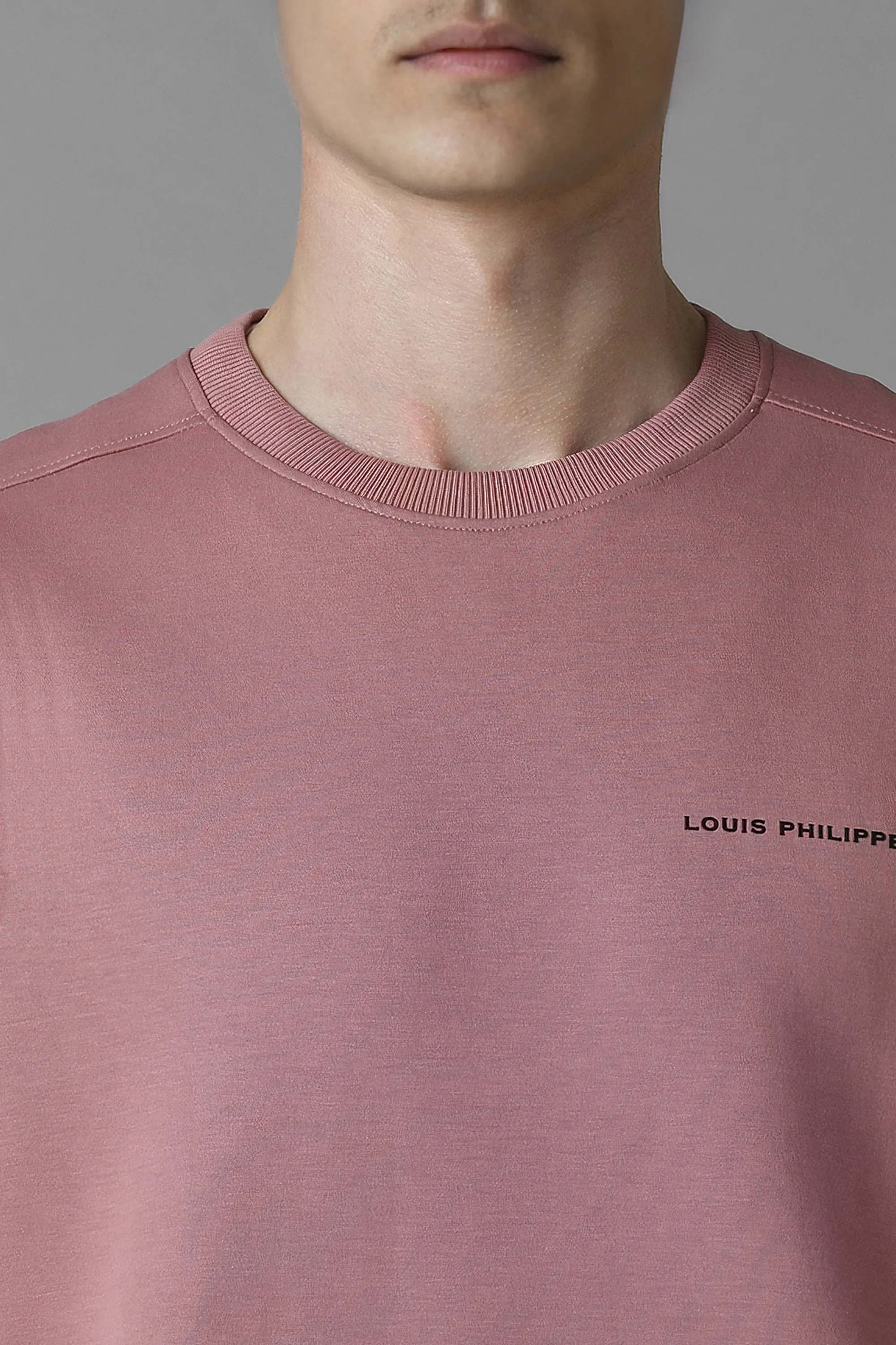 55138-men-casual-pink-solid-sweatshirt-pink-1.webp
