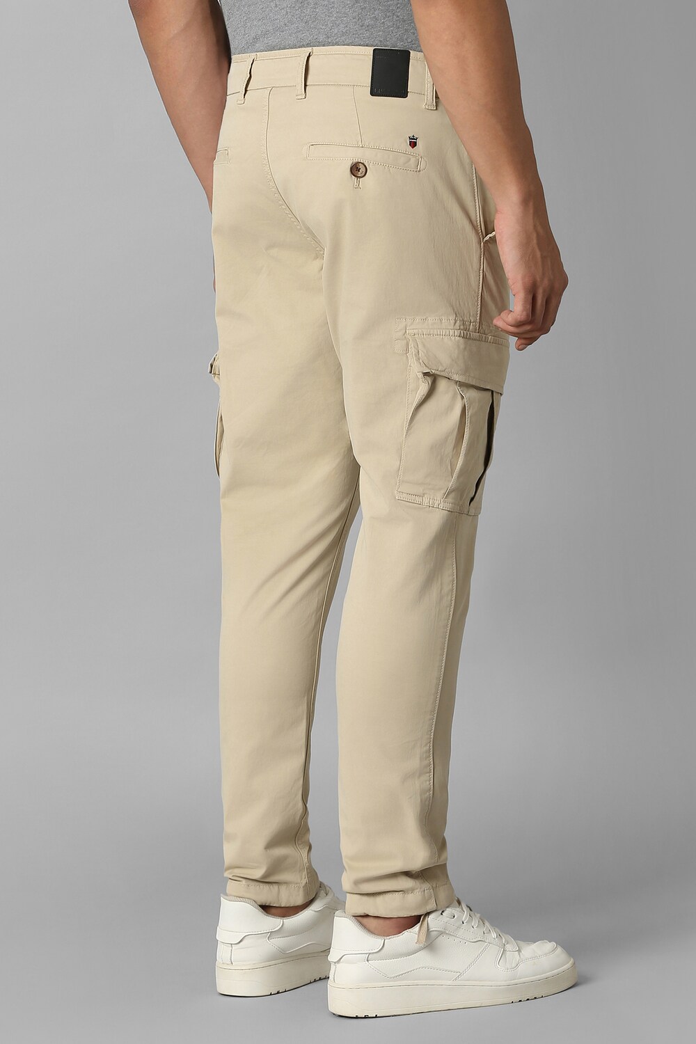 55559-men-beige-contemporary-fit-solid-flat-front-casual-trousers-beige-1.jpg