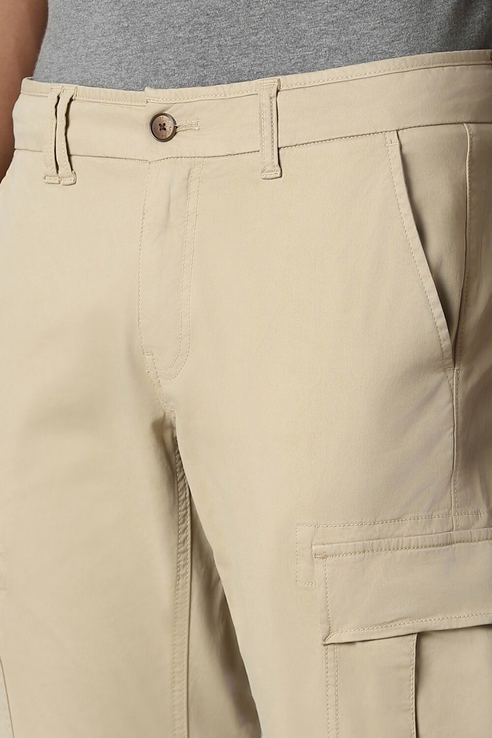 55559-men-beige-contemporary-fit-solid-flat-front-casual-trousers-beige-1.jpg