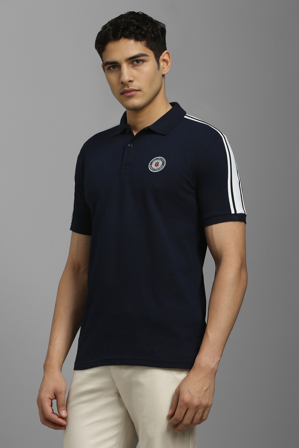 58672-men-navy-solid-polo-neck-t-shirt-navy-1.jpg