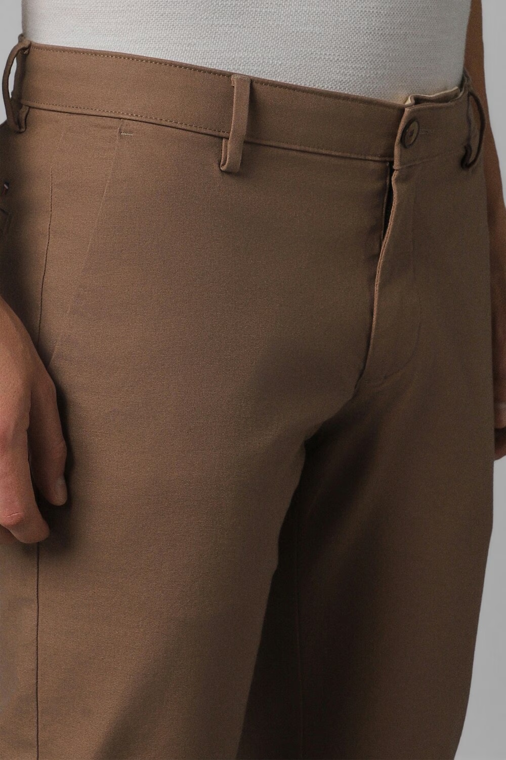59700-men-brown-super-slim-fit-solid-flat-front-casual-trousers-brown-1.jpg