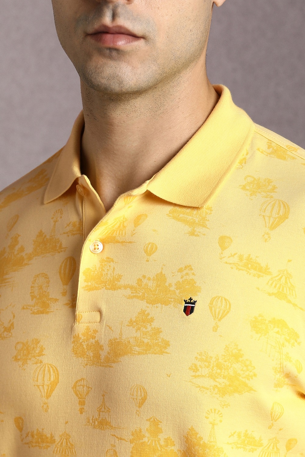 62170-men-yellow-print-polo-neck-t-shirt-yellow-1.jpg