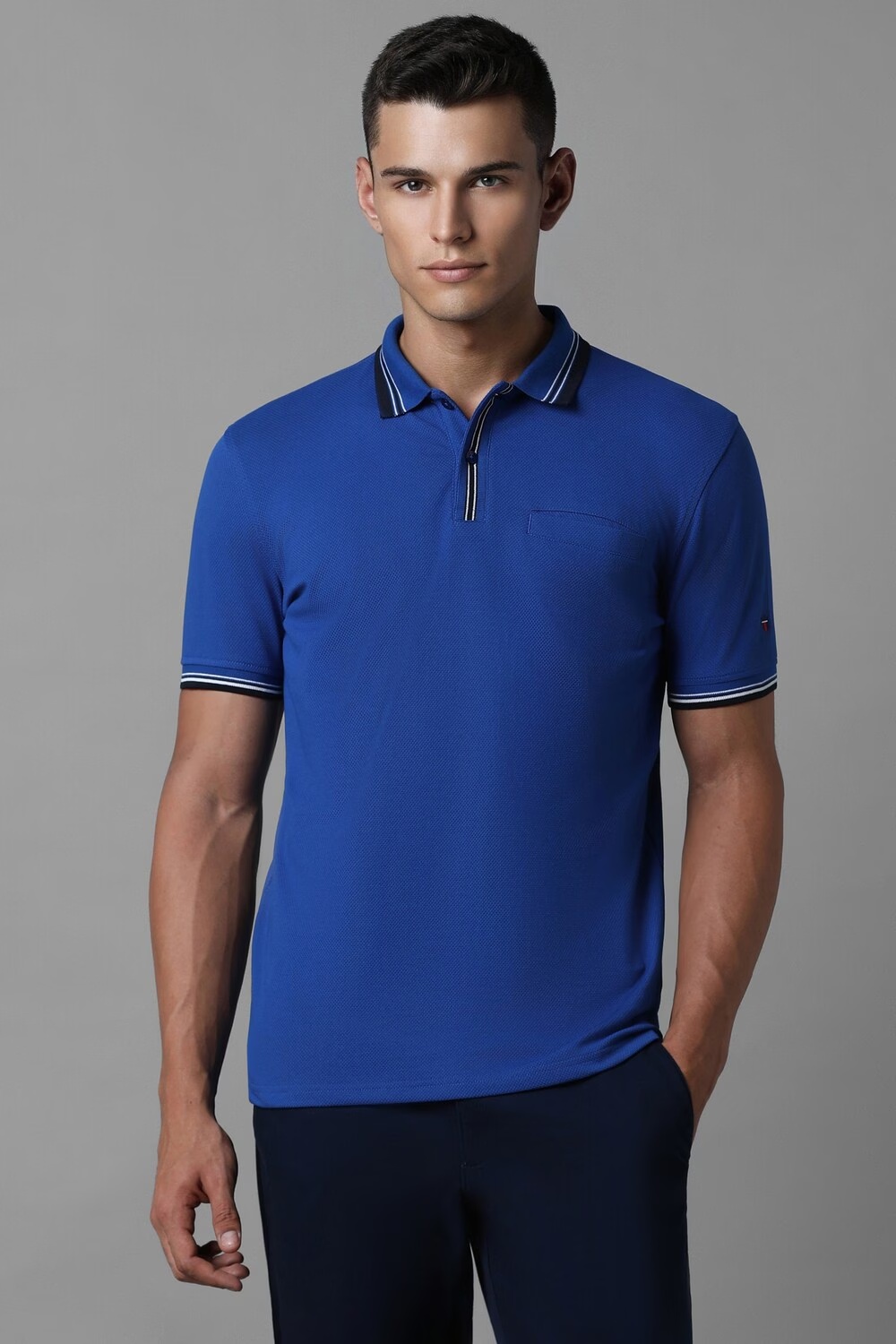 62352-men-blue-solid-polo-neck-t-shirt-blue-1.jpg