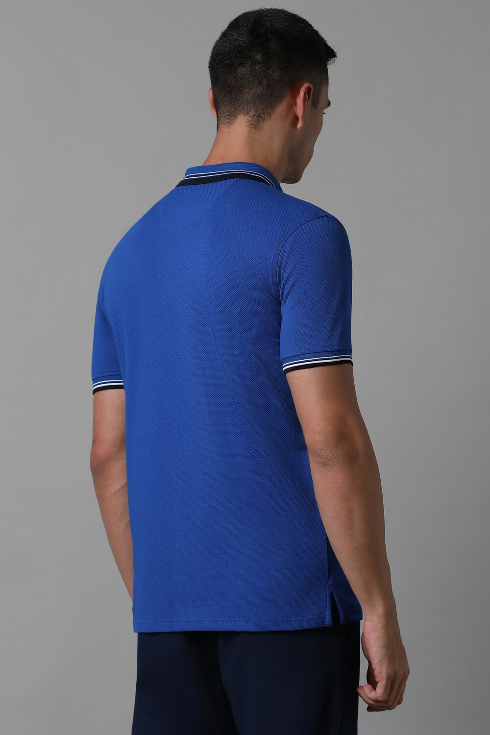 62352-men-blue-solid-polo-neck-t-shirt-blue-1.jpg
