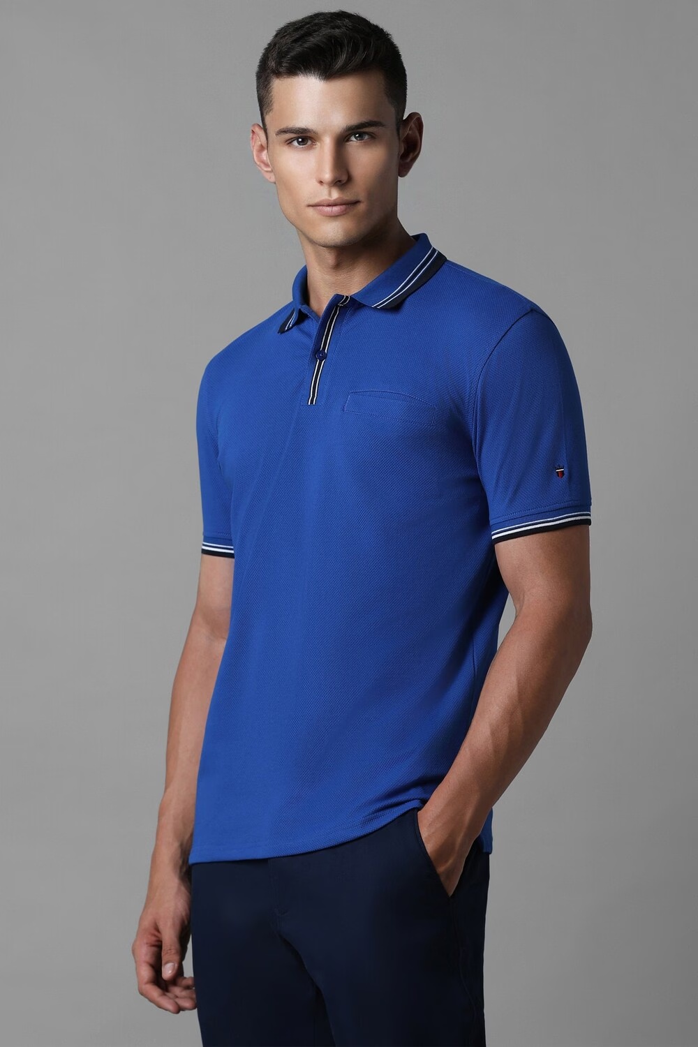 62352-men-blue-solid-polo-neck-t-shirt-blue-1.jpg