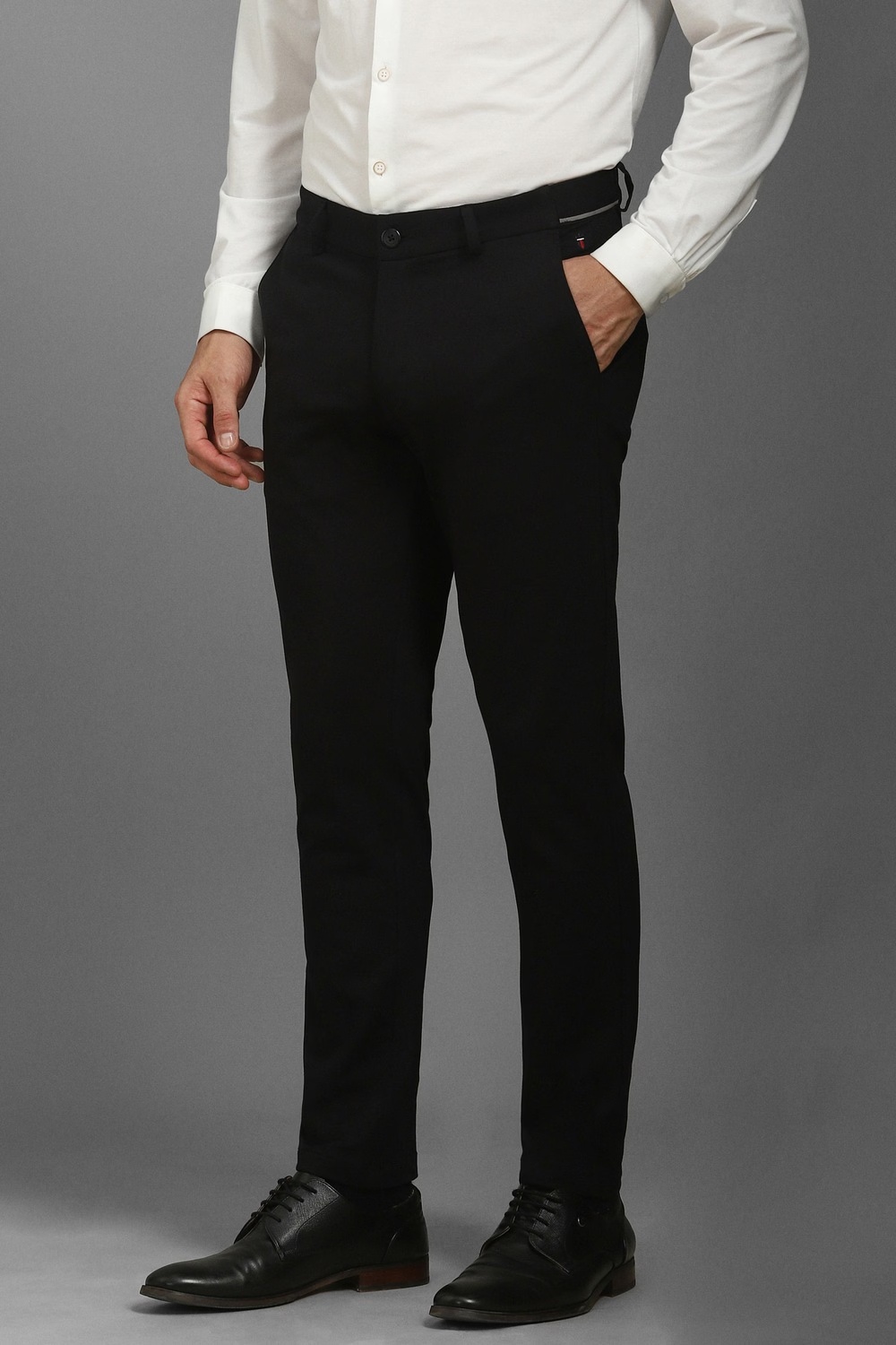 67078-men-black-contemporary-fit-solid-flat-front-casual-trousers-black-1.jpg