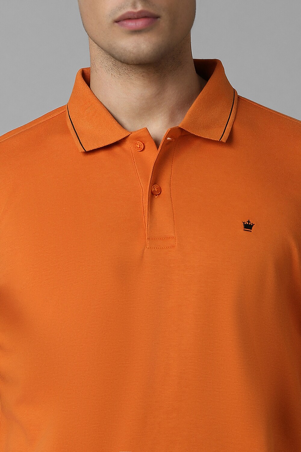 67508-men-orange-solid-polo-neck-t-shirt-orange-1.jpg