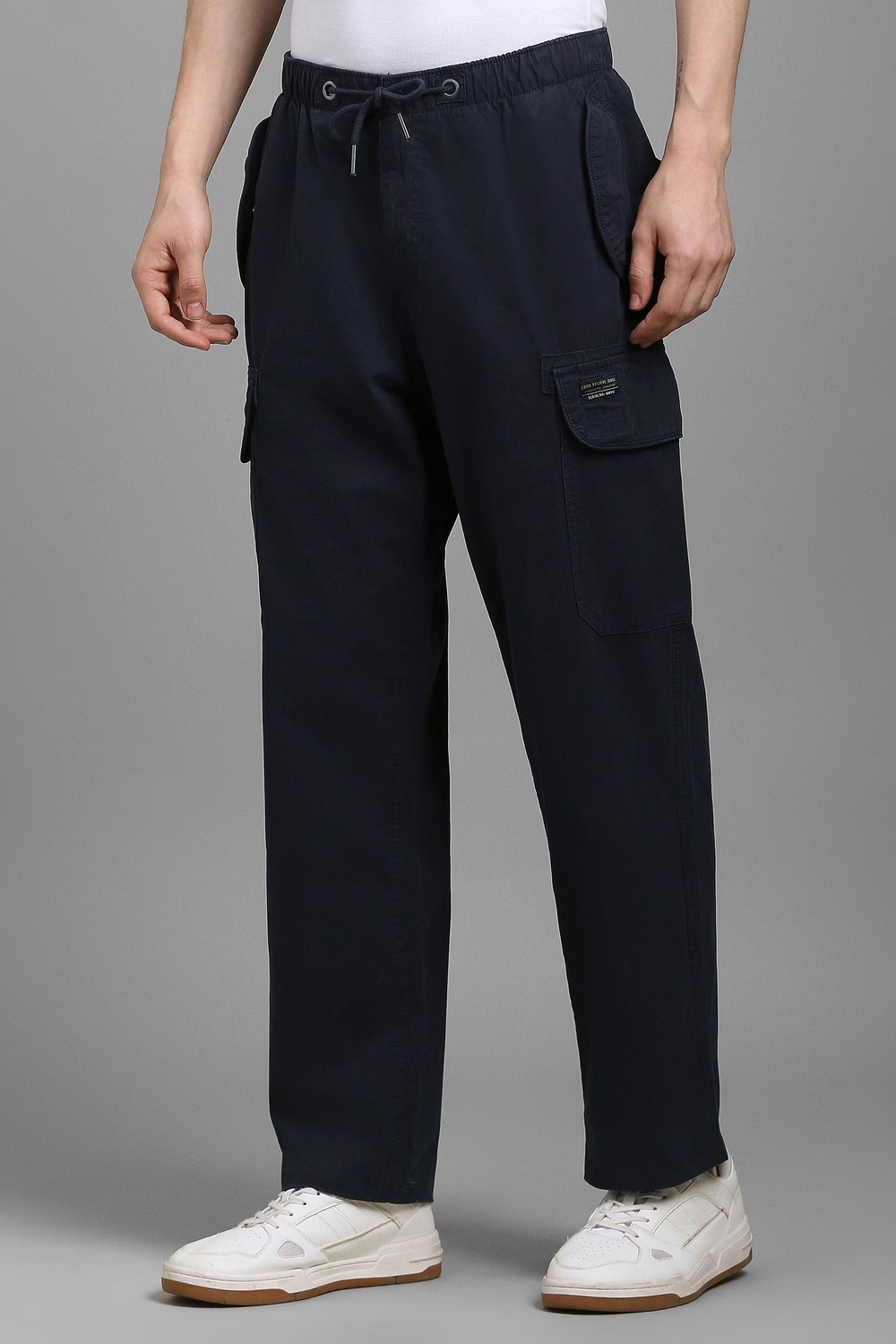 69204-men-navy-solid-flat-front-casual-trousers-navy-1.jpg