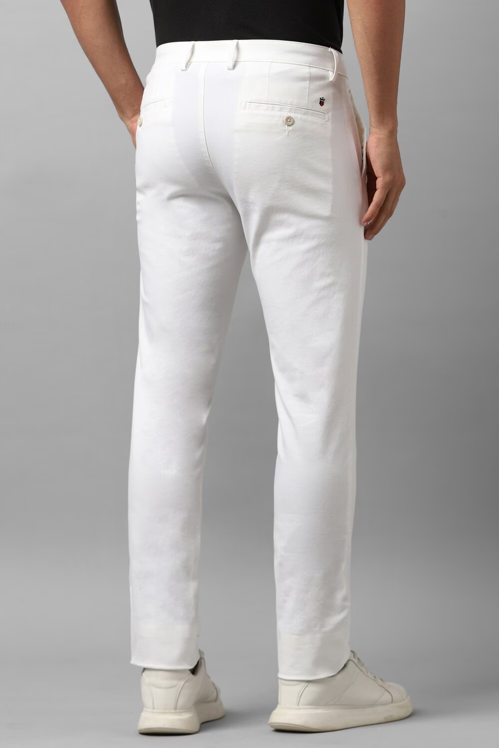 72199-men-white-slim-tapered-fit-solid-flat-front-casual-trousers-white-1.jpg