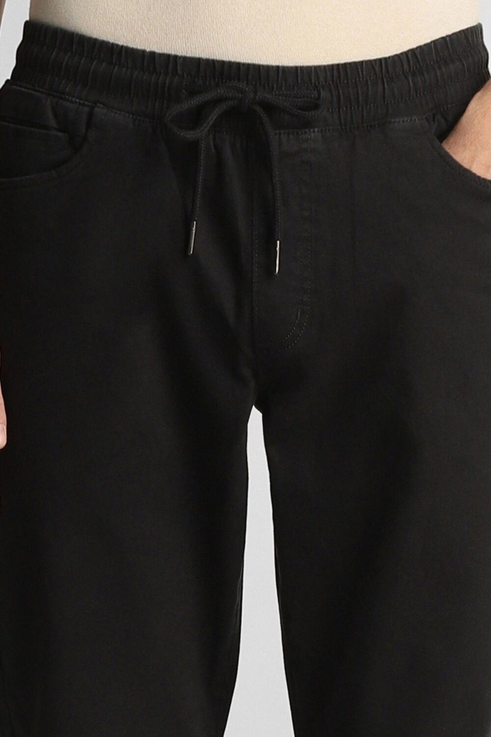 73449-men-black-solid-flat-front-casual-trousers-black-1.jpg
