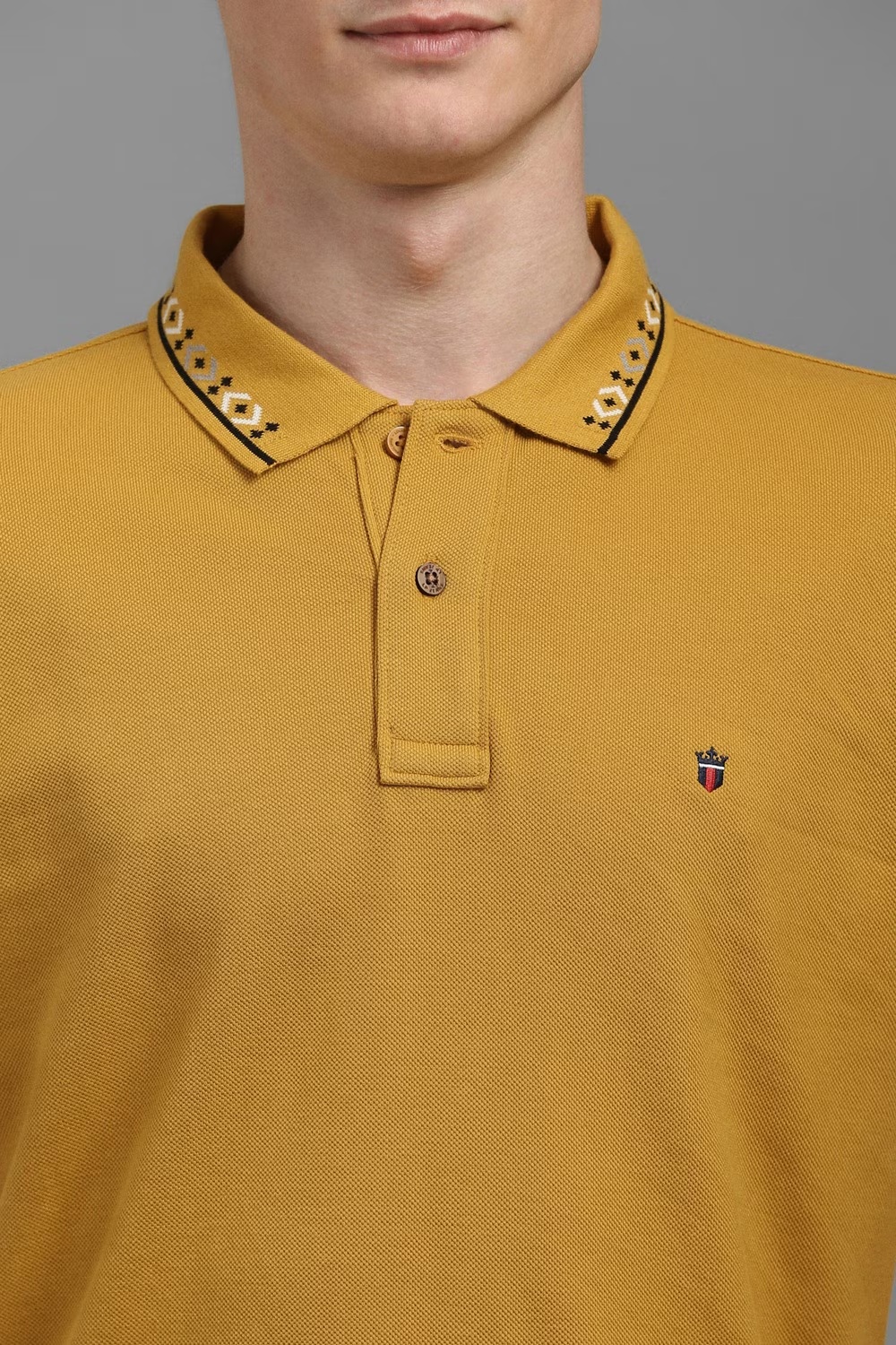 73812-men-yellow-solid-polo-neck-t-shirt-yellow-1.jpg