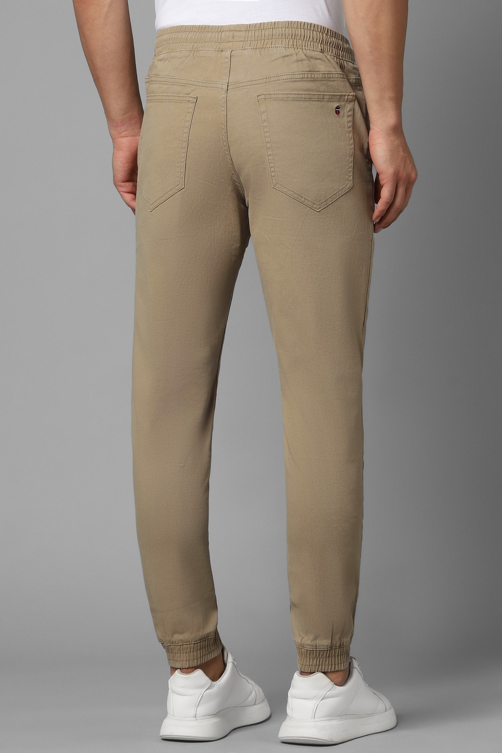 75063-men-khaki-solid-flat-front-casual-trousers-khaki-1.jpg