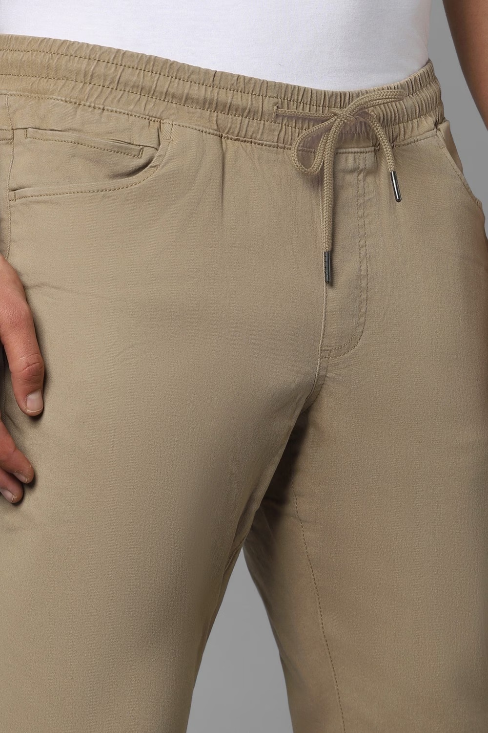 75063-men-khaki-solid-flat-front-casual-trousers-khaki-1.jpg