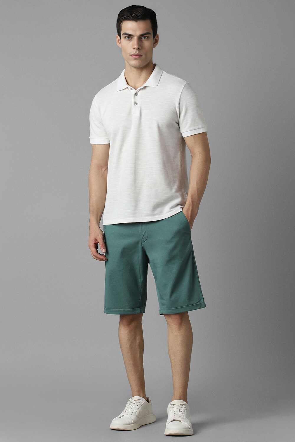 77242-men-green-solid-slim-fit-shorts-green-1.jpg