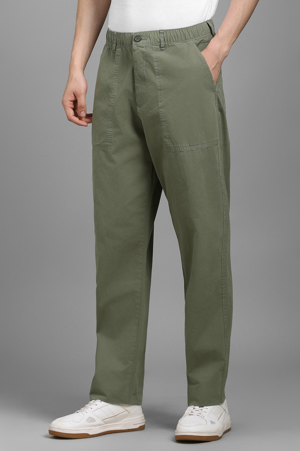 78982-men-olive-solid-flat-front-casual-trousers-olive-1.jpg
